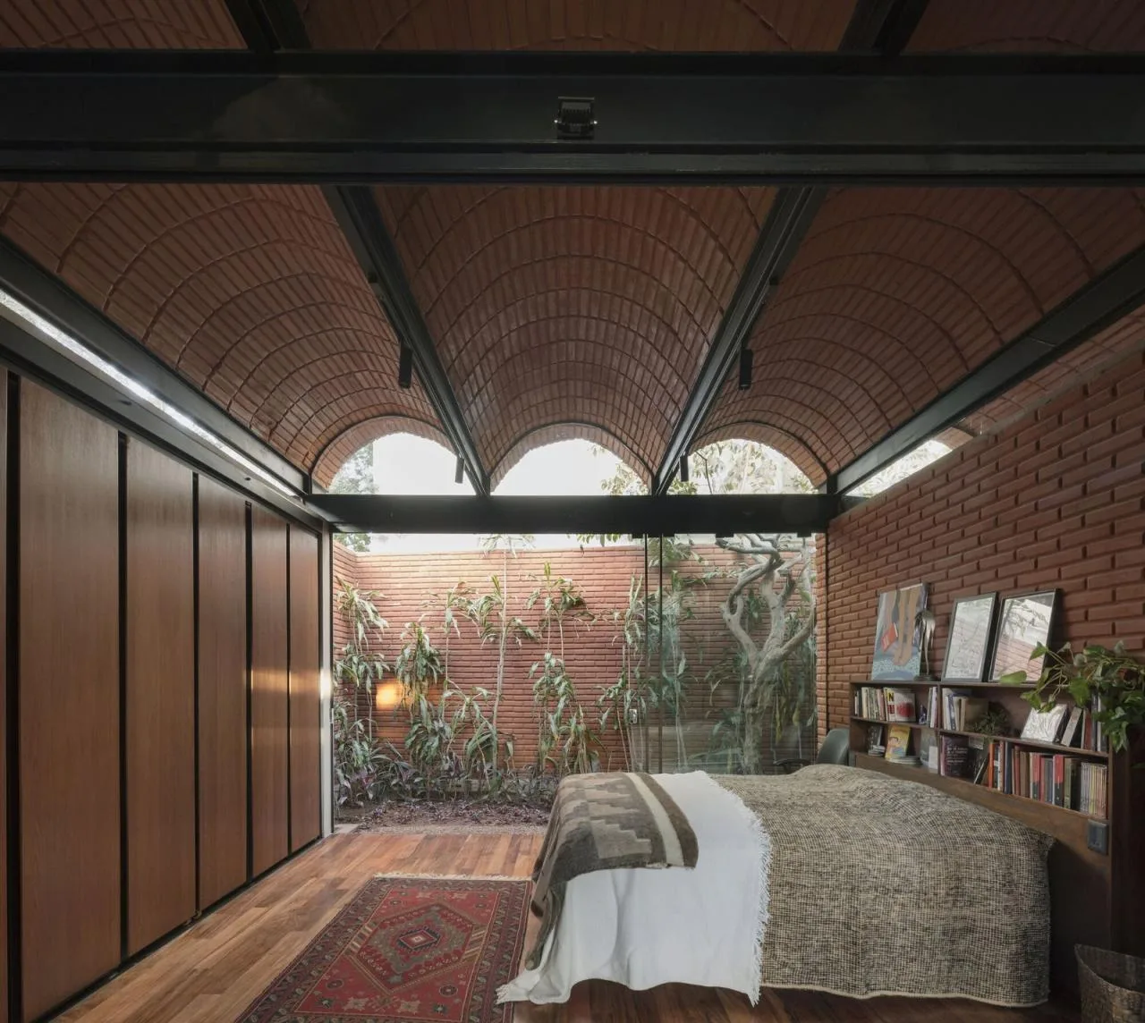 BIM Architecture | Handmade pressed brick and wood construction for self owned houses/Equipo de Arquitectura