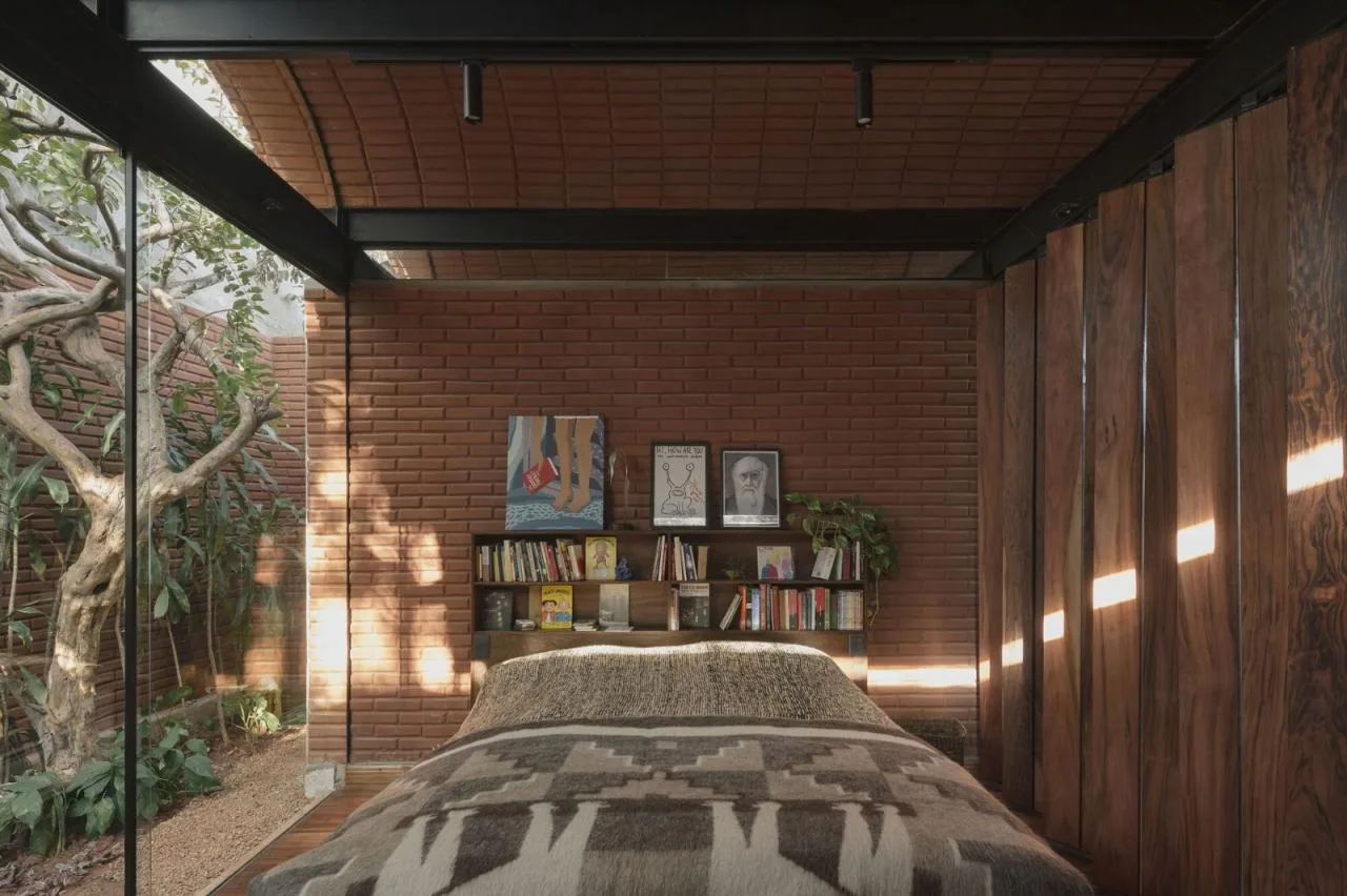 BIM Architecture | Handmade pressed brick and wood construction for self owned houses/Equipo de Arquitectura