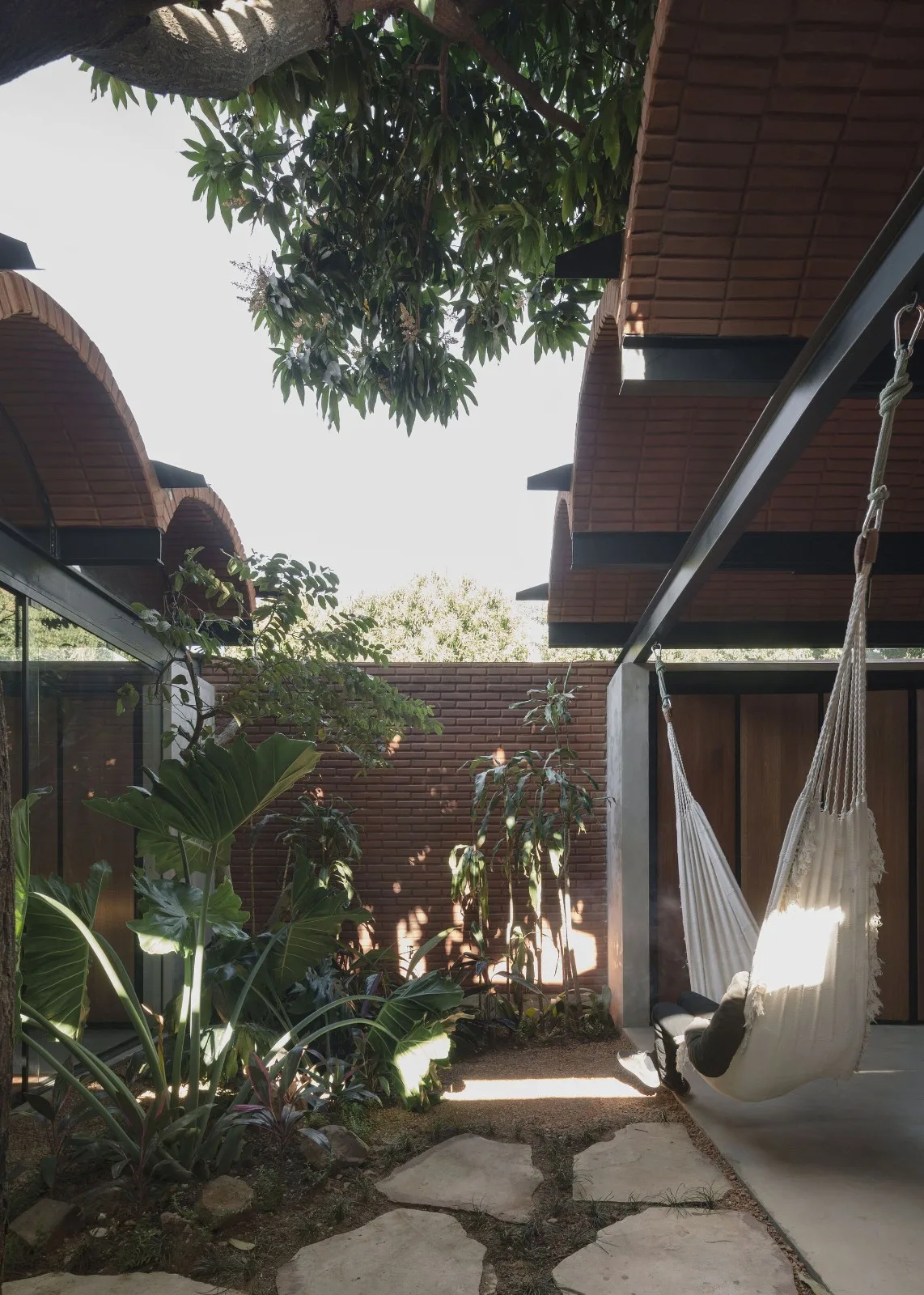 BIM Architecture | Handmade pressed brick and wood construction for self owned houses/Equipo de Arquitectura