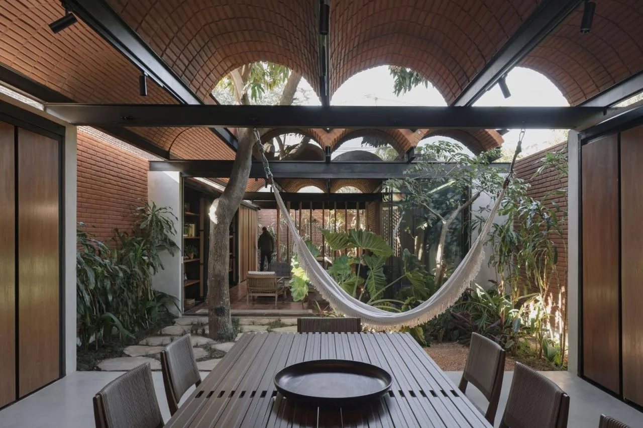 BIM Architecture | Handmade pressed brick and wood construction for self owned houses/Equipo de Arquitectura