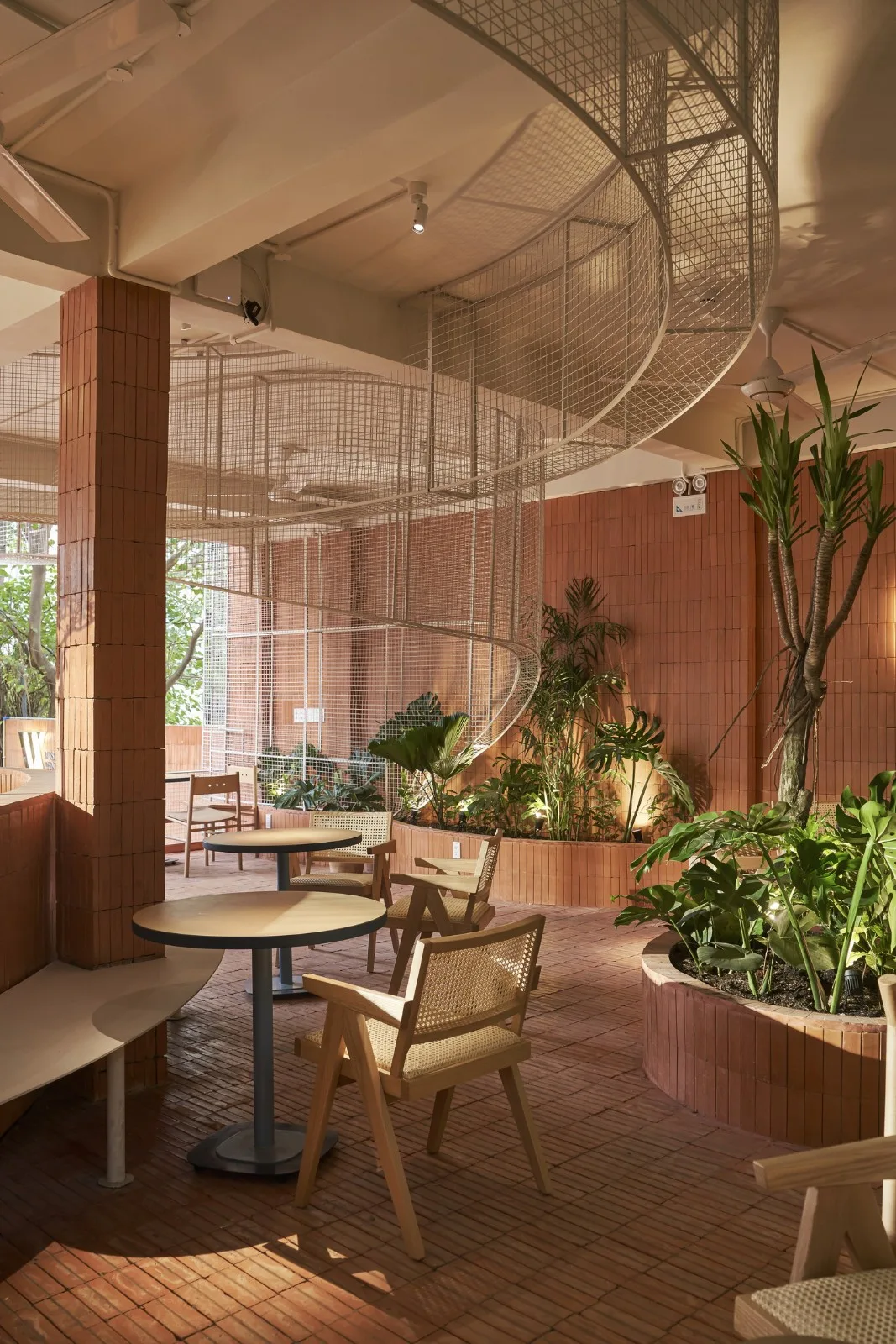 BIM Architecture | Collision of Curved Metal Grid and Red Clay Bricks: Brother Coffee Baking Shop/Red5 Studio