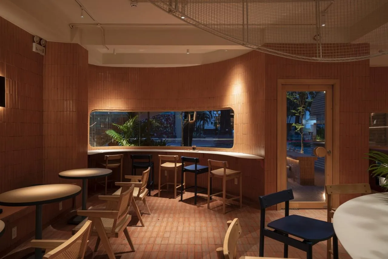 BIM Architecture | Collision of Curved Metal Grid and Red Clay Bricks: Brother Coffee Baking Shop/Red5 Studio