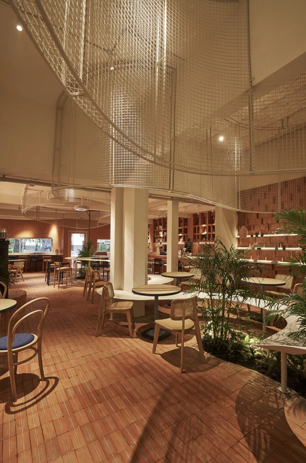 BIM Architecture | Collision of Curved Metal Grid and Red Clay Bricks: Brother Coffee Baking Shop/Red5 Studio