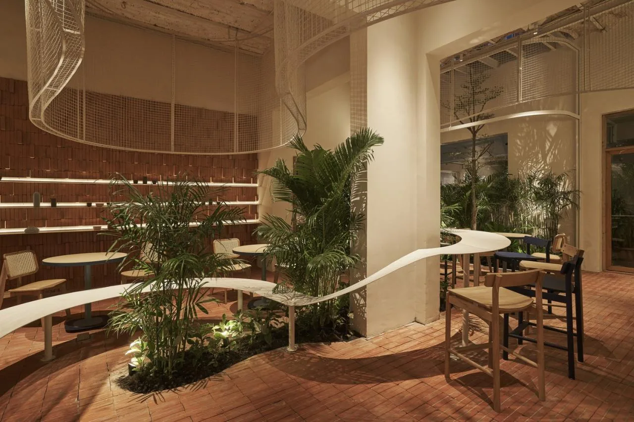 BIM Architecture | Collision of Curved Metal Grid and Red Clay Bricks: Brother Coffee Baking Shop/Red5 Studio