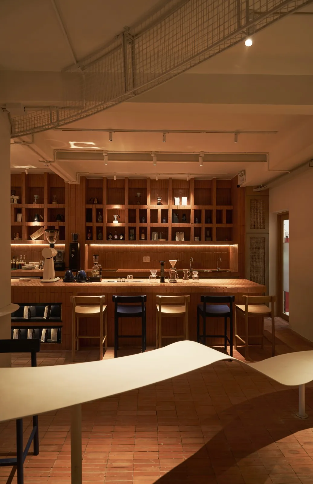 BIM Architecture | Collision of Curved Metal Grid and Red Clay Bricks: Brother Coffee Baking Shop/Red5 Studio