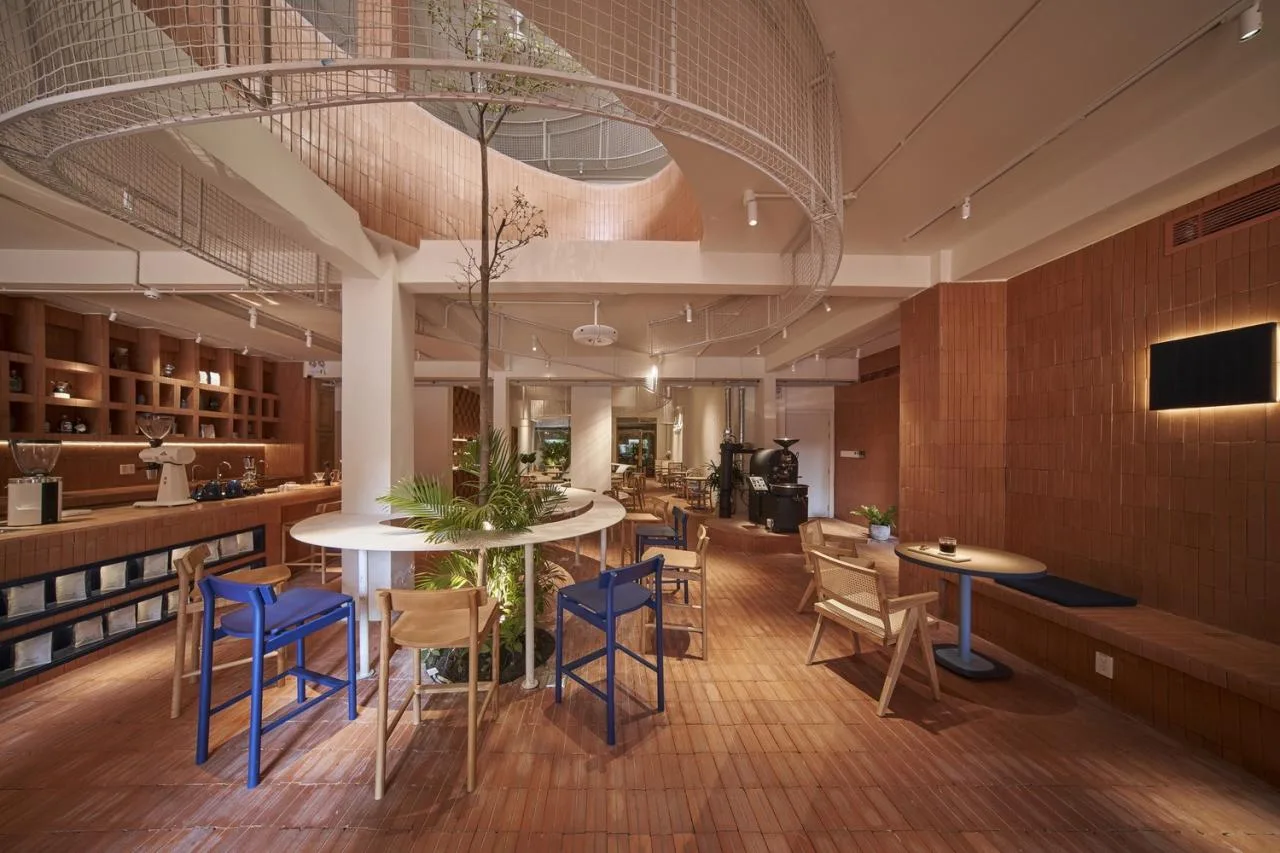 BIM Architecture | Collision of Curved Metal Grid and Red Clay Bricks: Brother Coffee Baking Shop/Red5 Studio