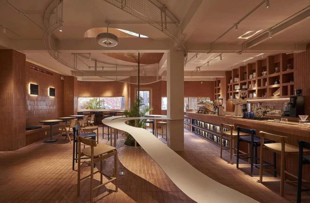 BIM Architecture | Collision of Curved Metal Grid and Red Clay Bricks: Brother Coffee Baking Shop/Red5 Studio