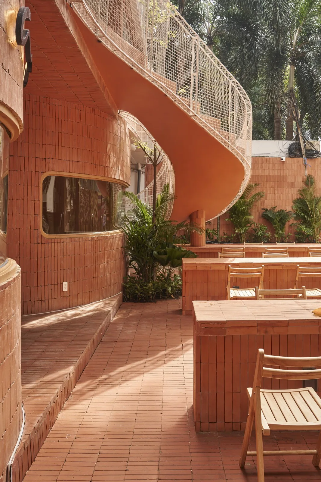 BIM Architecture | Collision of Curved Metal Grid and Red Clay Bricks: Brother Coffee Baking Shop/Red5 Studio