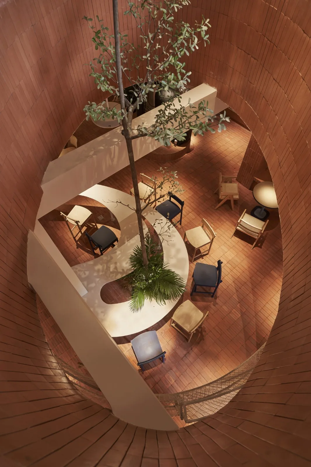 BIM Architecture | Collision of Curved Metal Grid and Red Clay Bricks: Brother Coffee Baking Shop/Red5 Studio