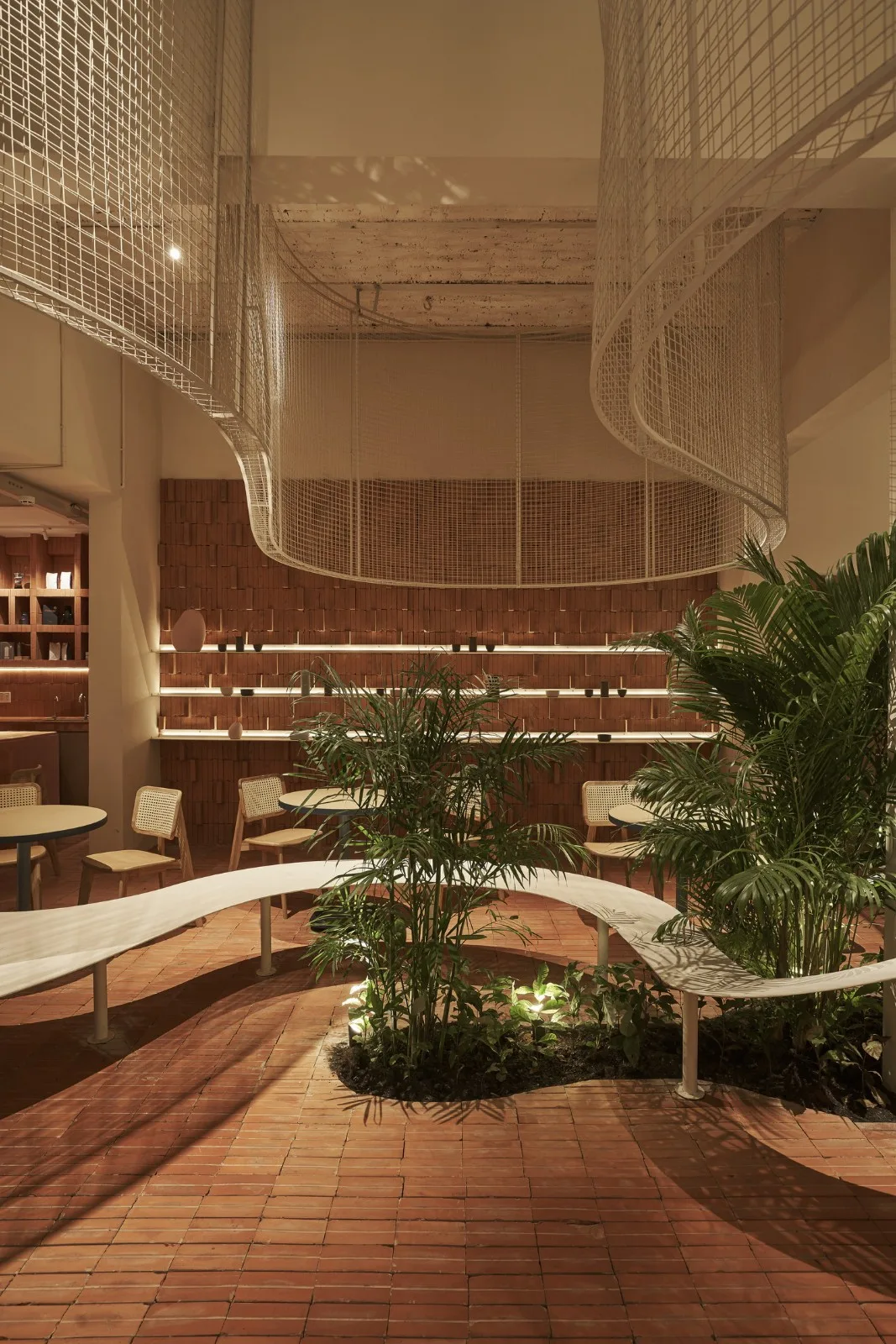 BIM Architecture | Collision of Curved Metal Grid and Red Clay Bricks: Brother Coffee Baking Shop/Red5 Studio