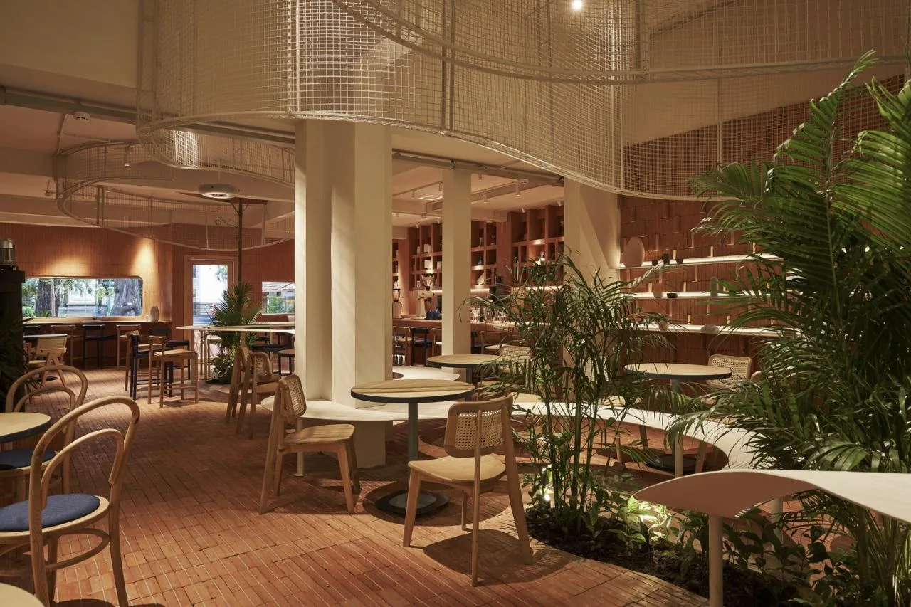 BIM Architecture | Collision of Curved Metal Grid and Red Clay Bricks: Brother Coffee Baking Shop/Red5 Studio