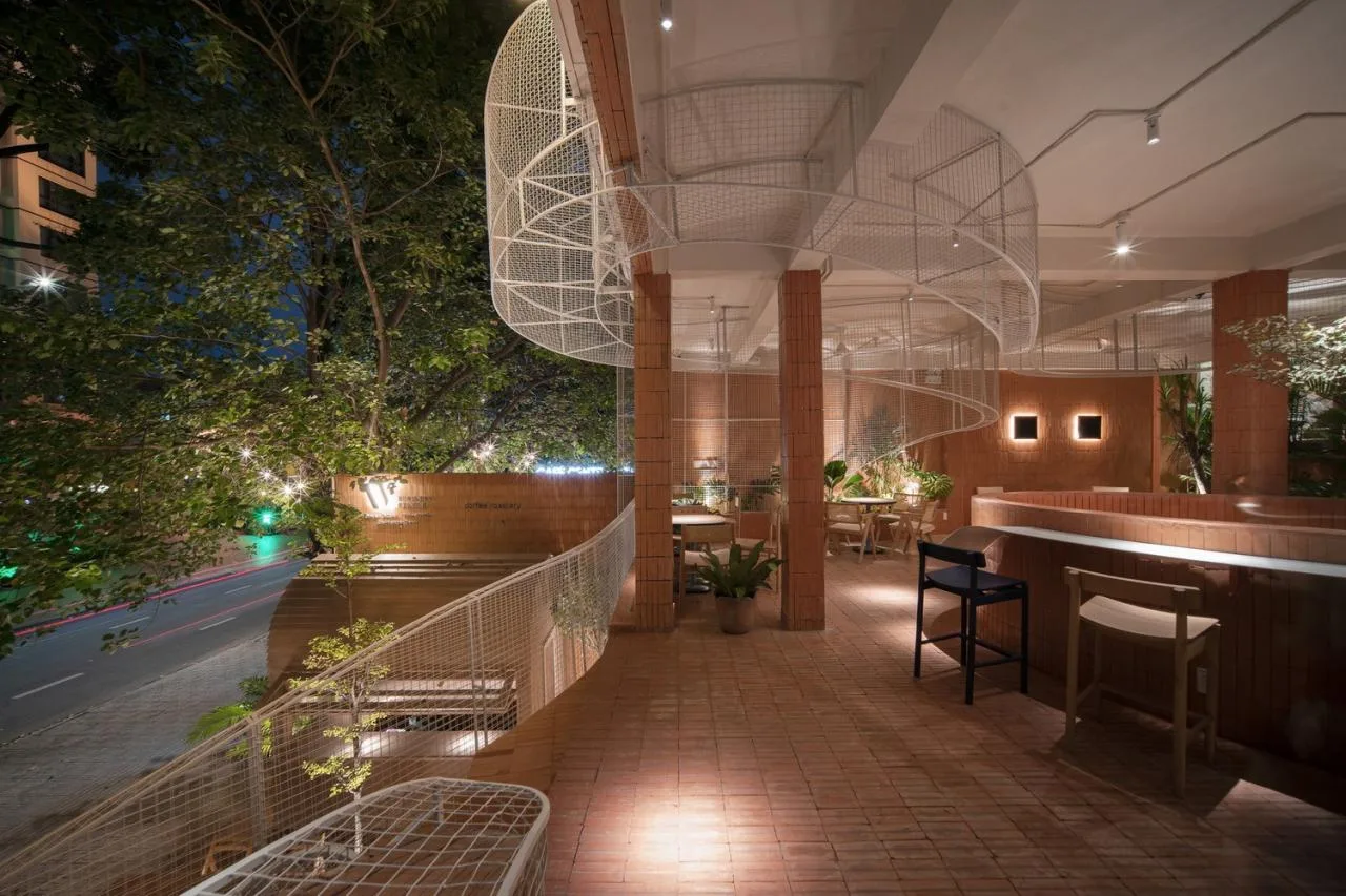 BIM Architecture | Collision of Curved Metal Grid and Red Clay Bricks: Brother Coffee Baking Shop/Red5 Studio