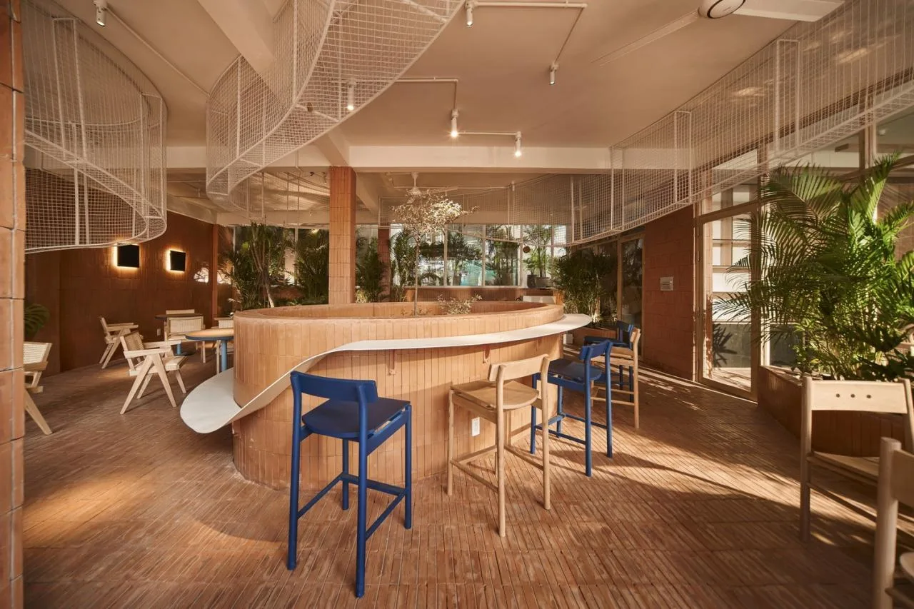 BIM Architecture | Collision of Curved Metal Grid and Red Clay Bricks: Brother Coffee Baking Shop/Red5 Studio