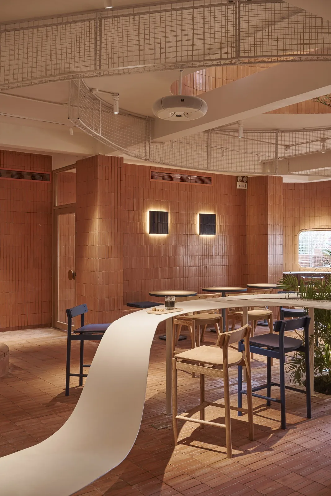 BIM Architecture | Collision of Curved Metal Grid and Red Clay Bricks: Brother Coffee Baking Shop/Red5 Studio
