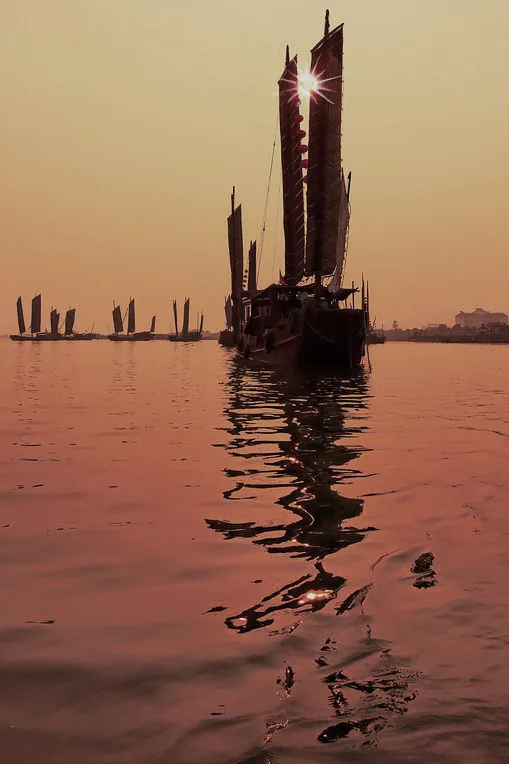 Sunset sailboat shadow