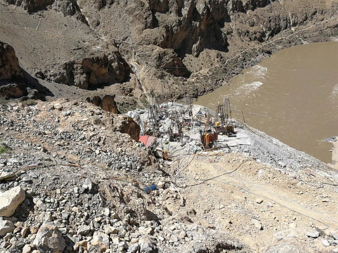 Water mill drills for cliff pile driving