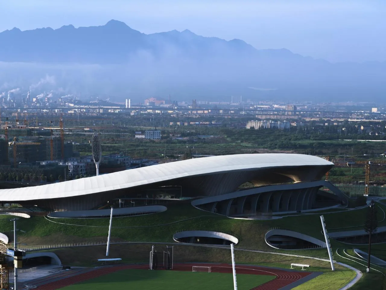 BIM Architecture | Design of the World's Largest Earthly Covered Building Complex: 'Disappearing Stadium'/MAD Ma Yansong