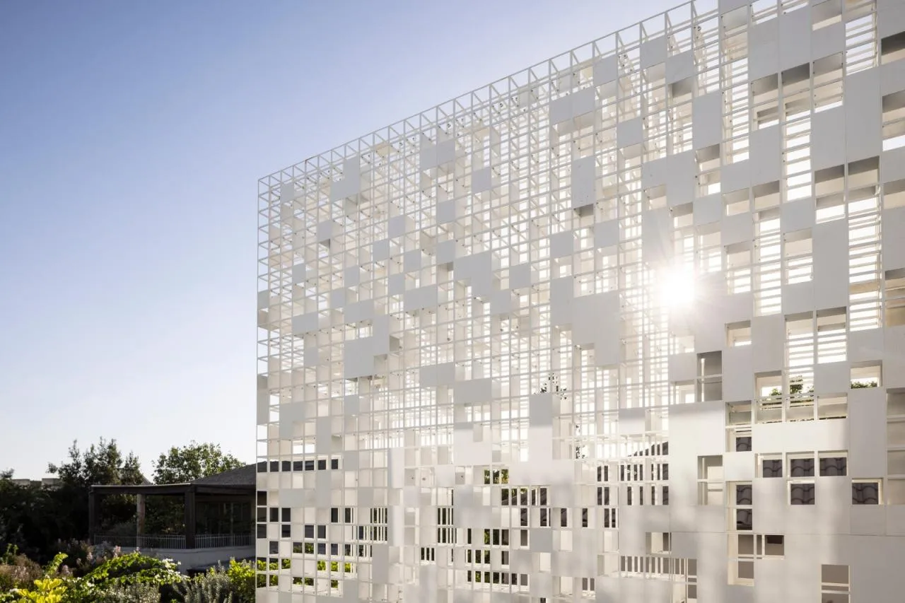 BIM Architecture | A 'gradually disappearing' wall, dissolving pixel houses/Anderman Architects