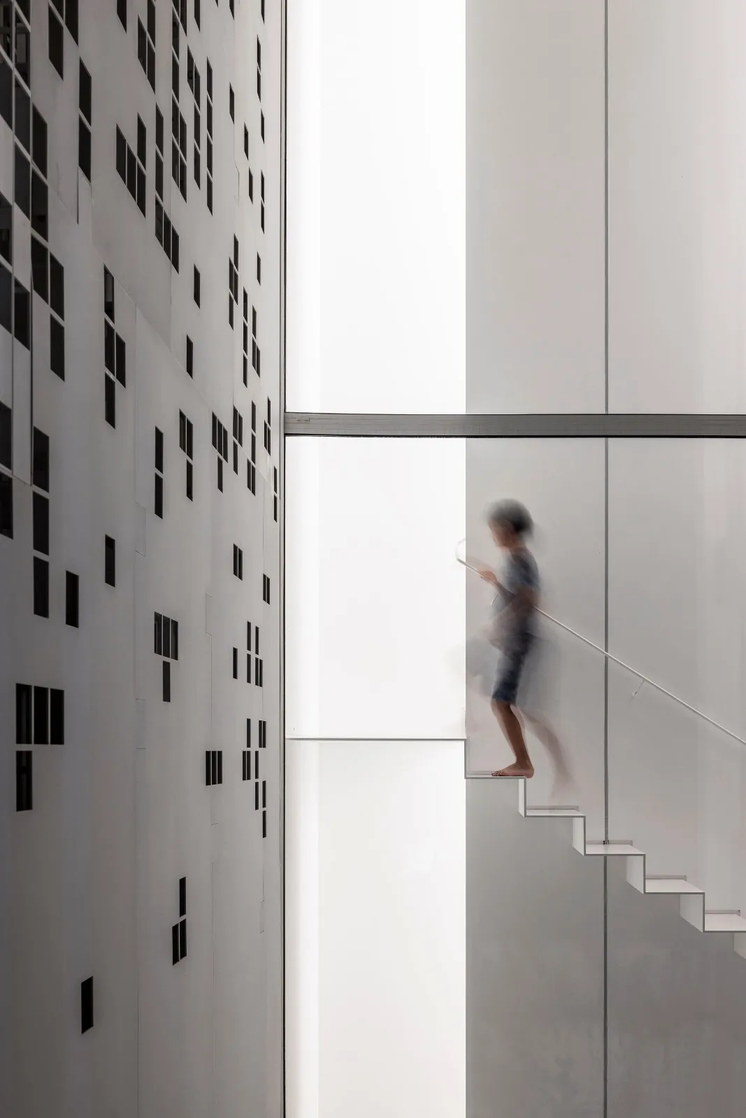 BIM Architecture | A 'gradually disappearing' wall, dissolving pixel houses/Anderman Architects