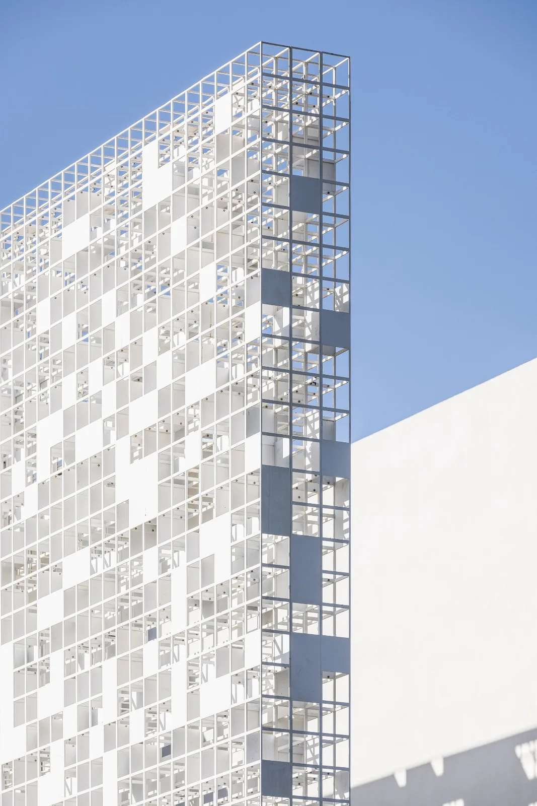 BIM Architecture | A 'gradually disappearing' wall, dissolving pixel houses/Anderman Architects