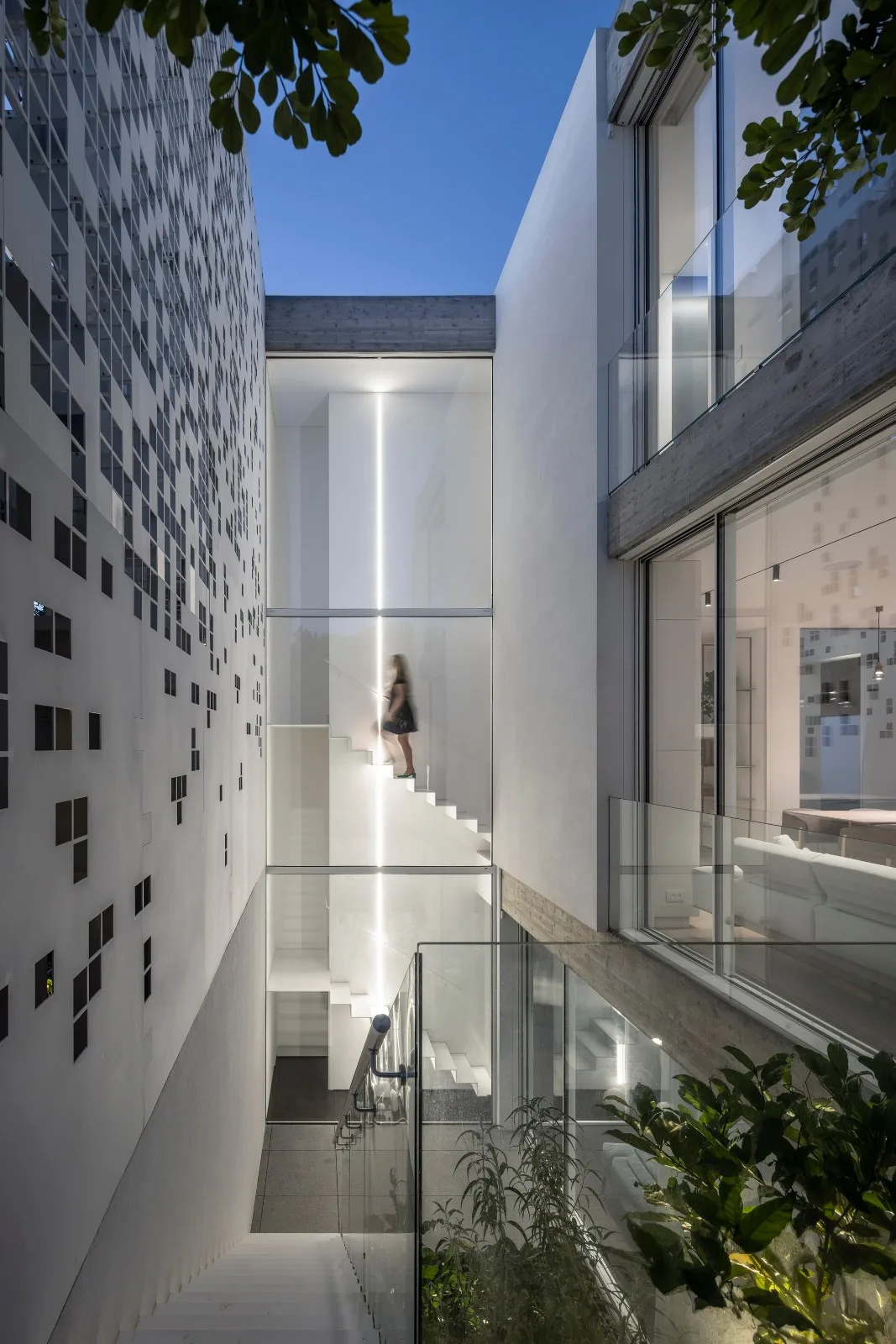 BIM Architecture | A 'gradually disappearing' wall, dissolving pixel houses/Anderman Architects