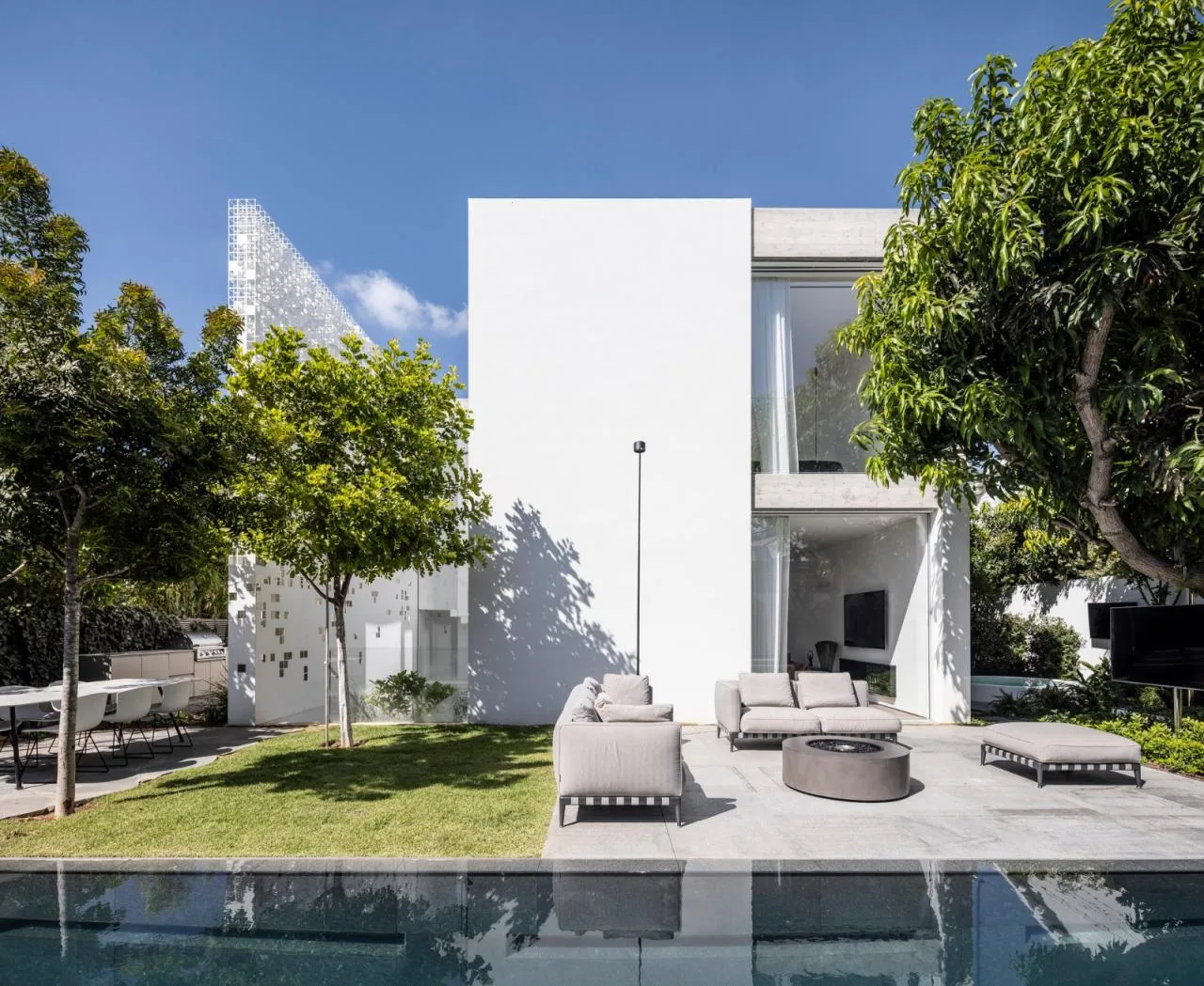 BIM Architecture | A 'gradually disappearing' wall, dissolving pixel houses/Anderman Architects
