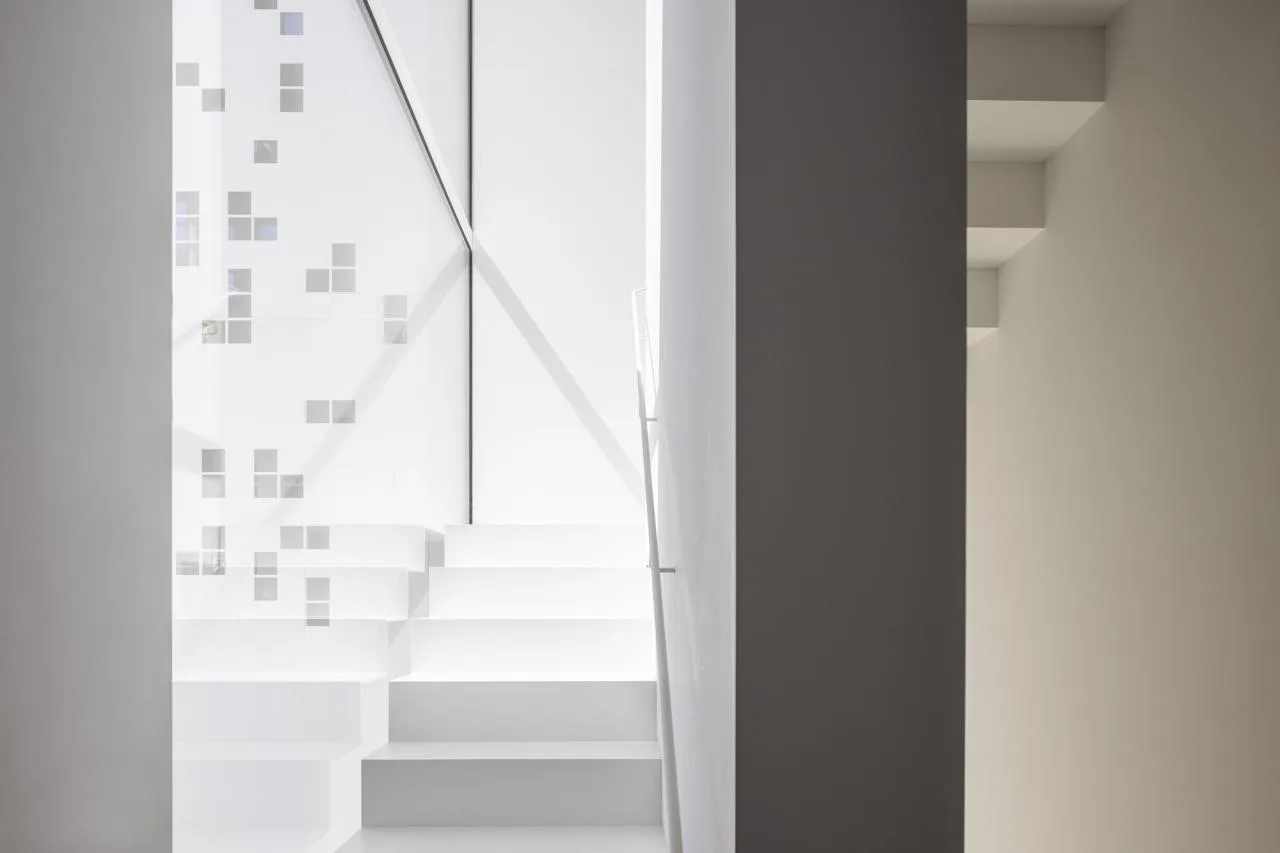 BIM Architecture | A 'gradually disappearing' wall, dissolving pixel houses/Anderman Architects