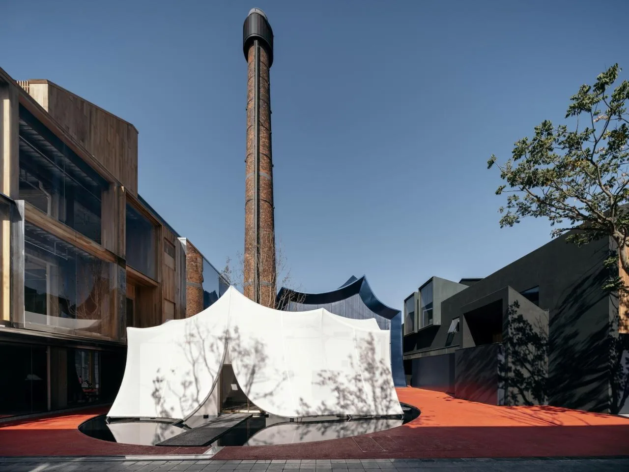 BIM Architecture | Qingqiu and Baiya: Under the undulating blue hills resembling waves, lies our 'swaying human world'/Wutopia Lab