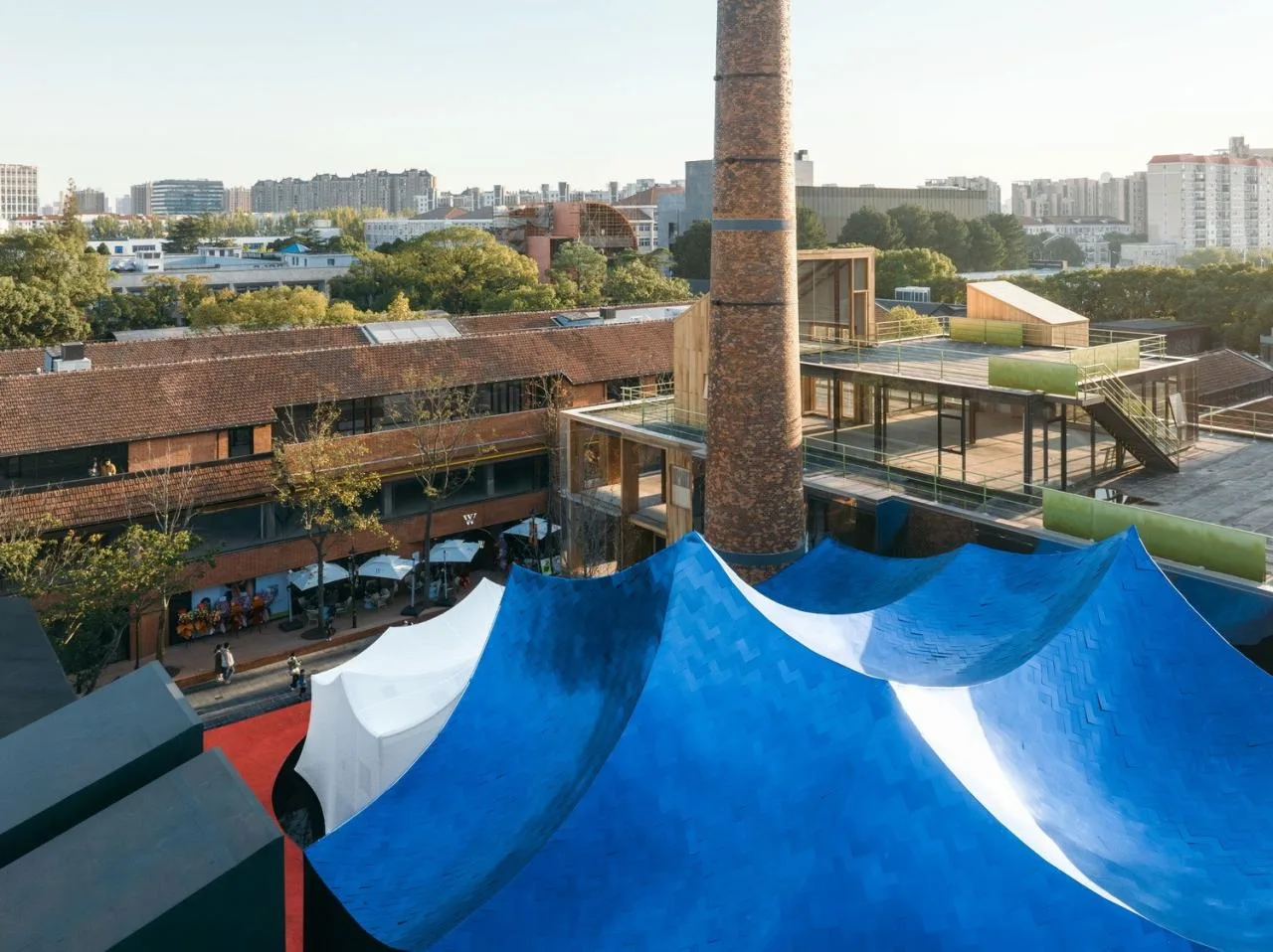 BIM Architecture | Qingqiu and Baiya: Under the undulating blue hills resembling waves, lies our 'swaying human world'/Wutopia Lab