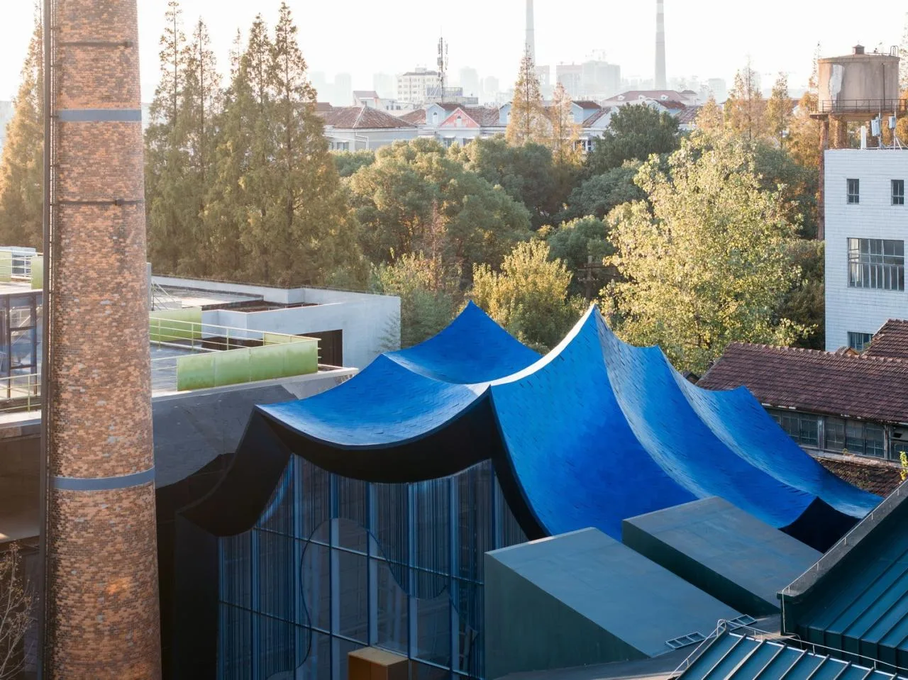 BIM Architecture | Qingqiu and Baiya: Under the undulating blue hills resembling waves, lies our 'swaying human world'/Wutopia Lab