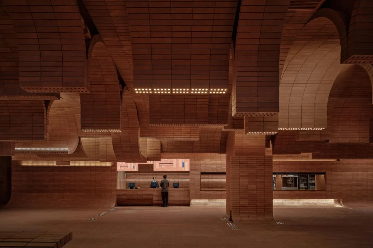 BIM Architecture | Island Cinema Wrapped in "Brick Waves"/Yizheng Planning