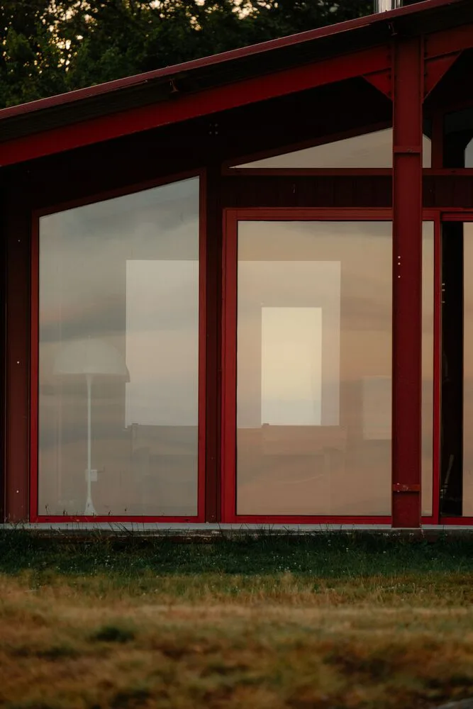 A serene vacation home design with red gemstones hidden in a lush and magnificent environment