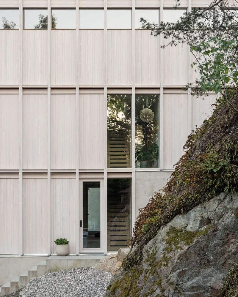 Miracle of architecture by the strait, challenging the terrain to create a stunning view of wooden villa design