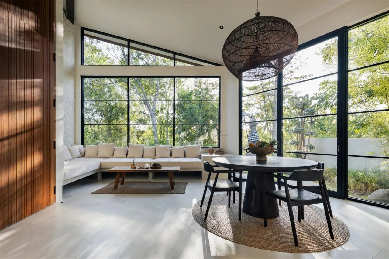 The Wabi Sabi Realm in the Poetic Forest: Design of a Natural Villa Under a Flipped Roof