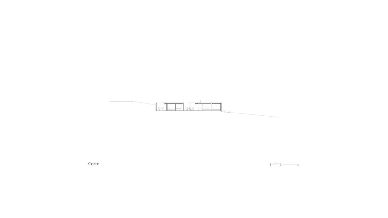 Design of a vacation home with a natural extension of the courtyard core by embedding the terrain underground