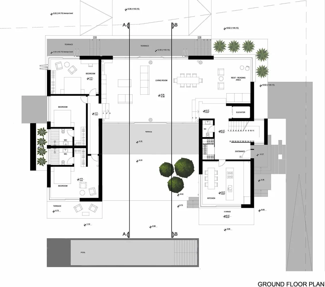 Design of a vacation villa combining concrete and glass for houses flowing through the forest
