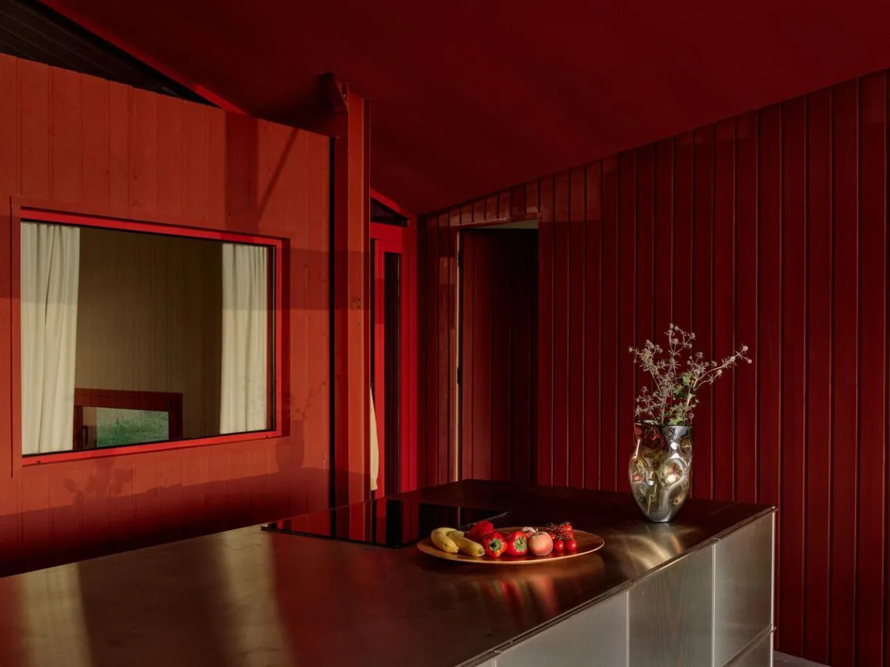 A serene vacation home design with red gemstones hidden in a lush and magnificent environment