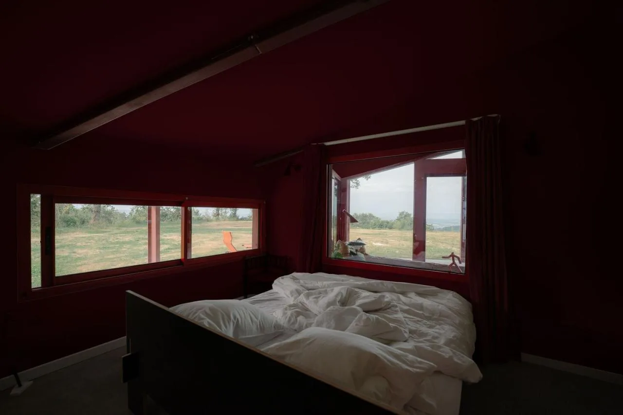 A serene vacation home design with red gemstones hidden in a lush and magnificent environment