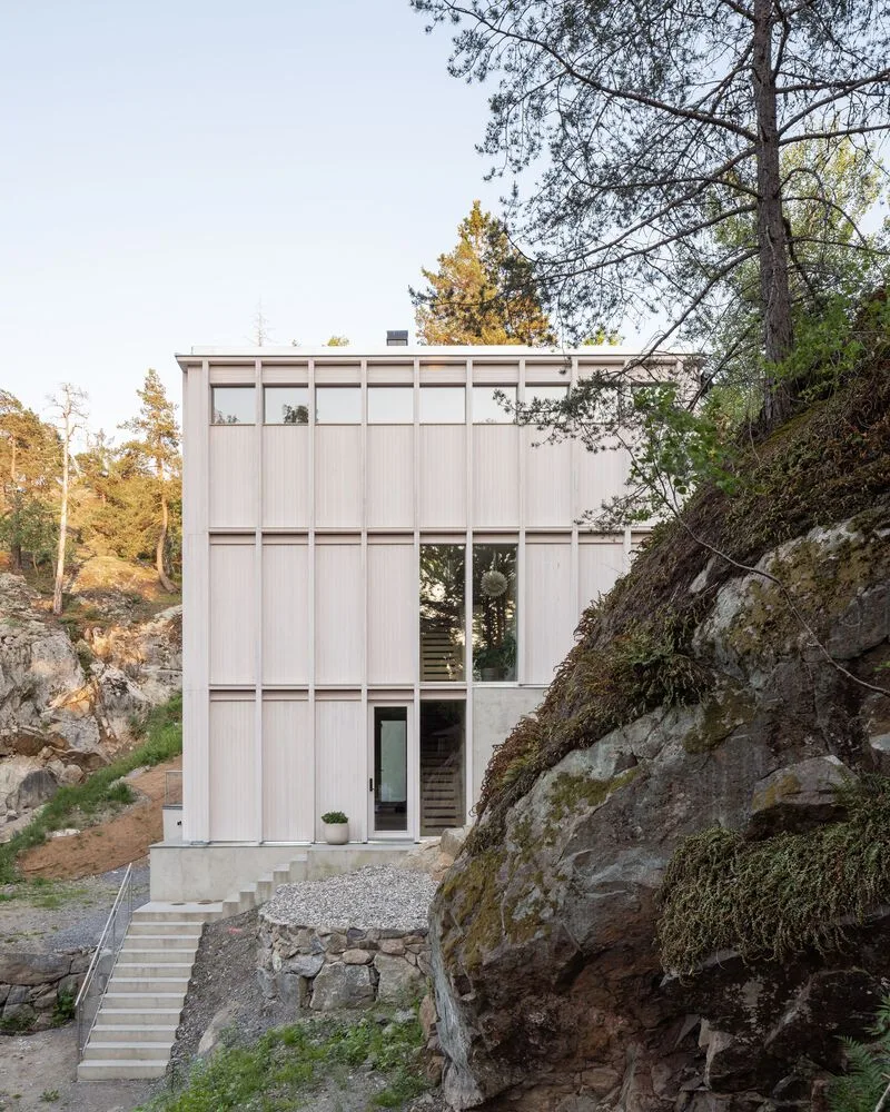 Miracle of architecture by the strait, challenging the terrain to create a stunning view of wooden villa design