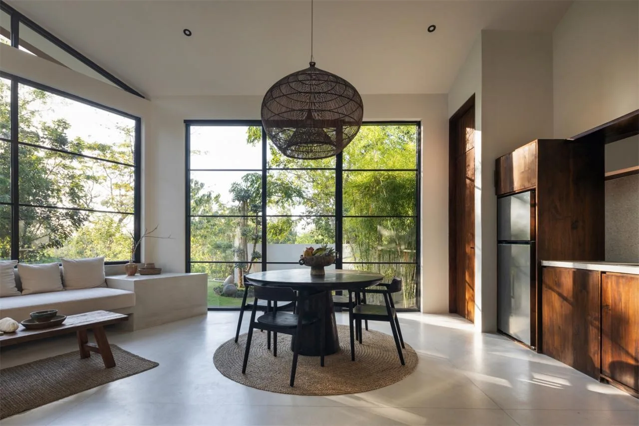 The Wabi Sabi Realm in the Poetic Forest: Design of a Natural Villa Under a Flipped Roof