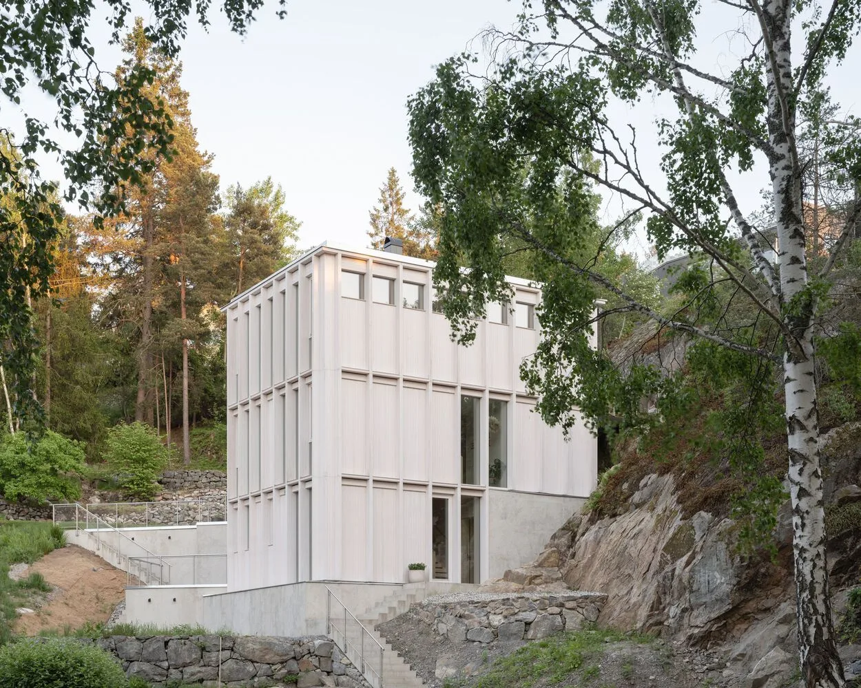 Miracle of architecture by the strait, challenging the terrain to create a stunning view of wooden villa design
