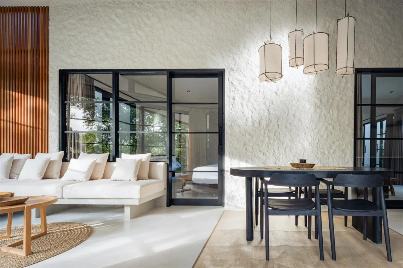 The Wabi Sabi Realm in the Poetic Forest: Design of a Natural Villa Under a Flipped Roof