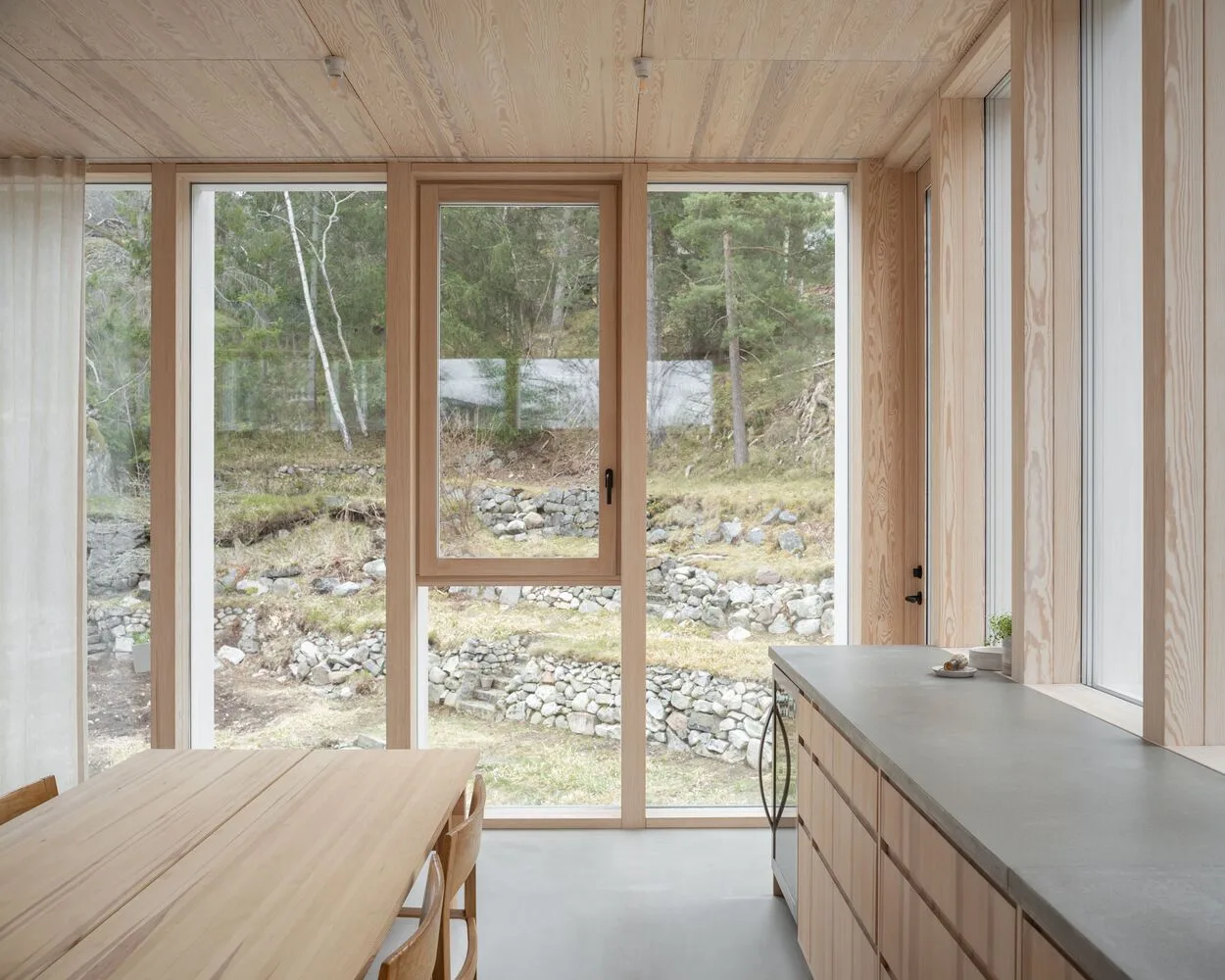 Miracle of architecture by the strait, challenging the terrain to create a stunning view of wooden villa design