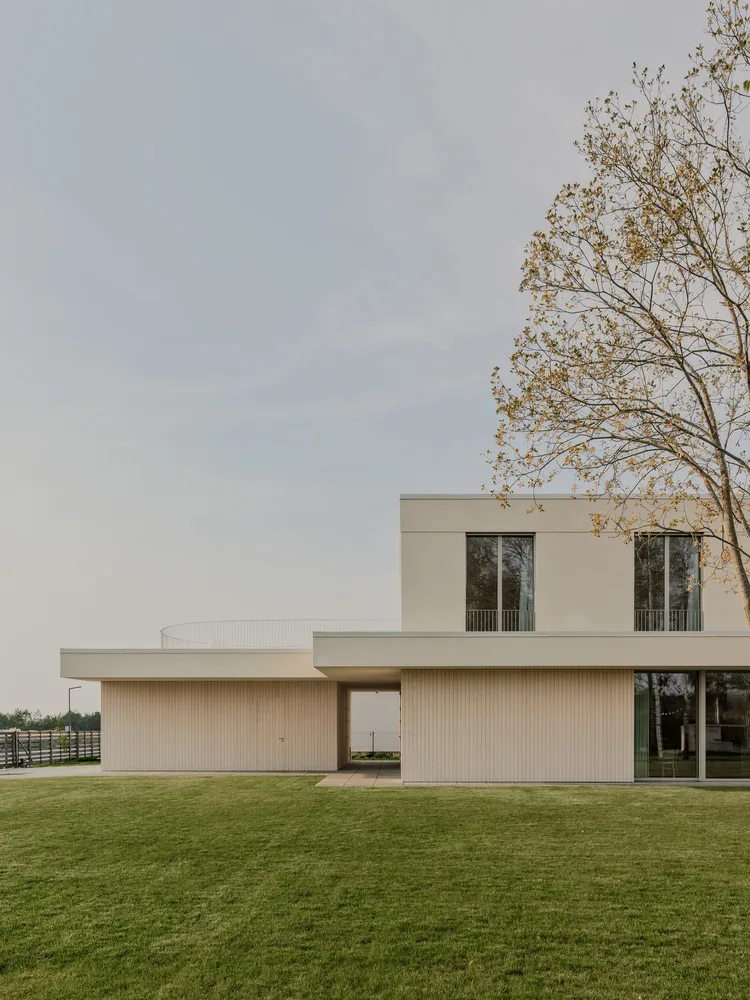 A minimalist villa design with warm, natural, smooth details, simple linear symmetry rhythm