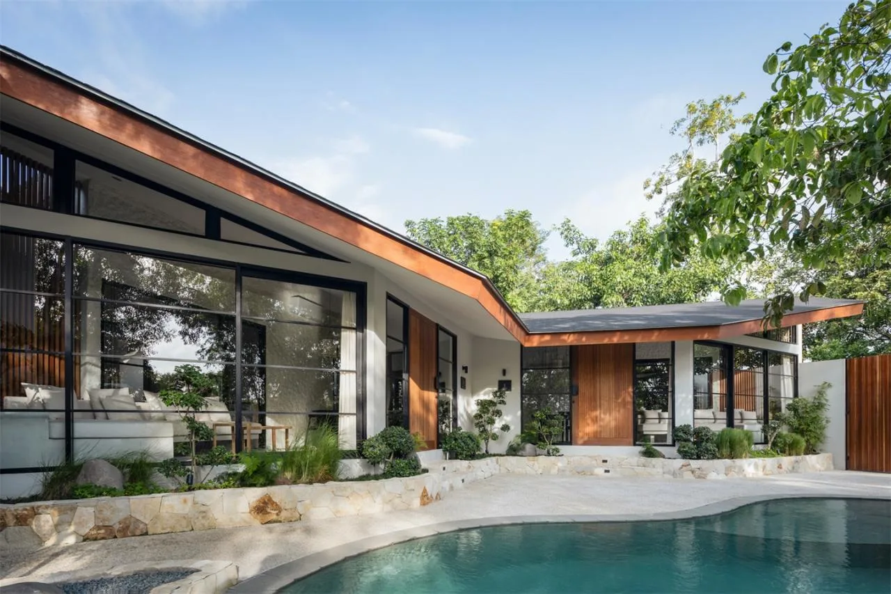 The Wabi Sabi Realm in the Poetic Forest: Design of a Natural Villa Under a Flipped Roof