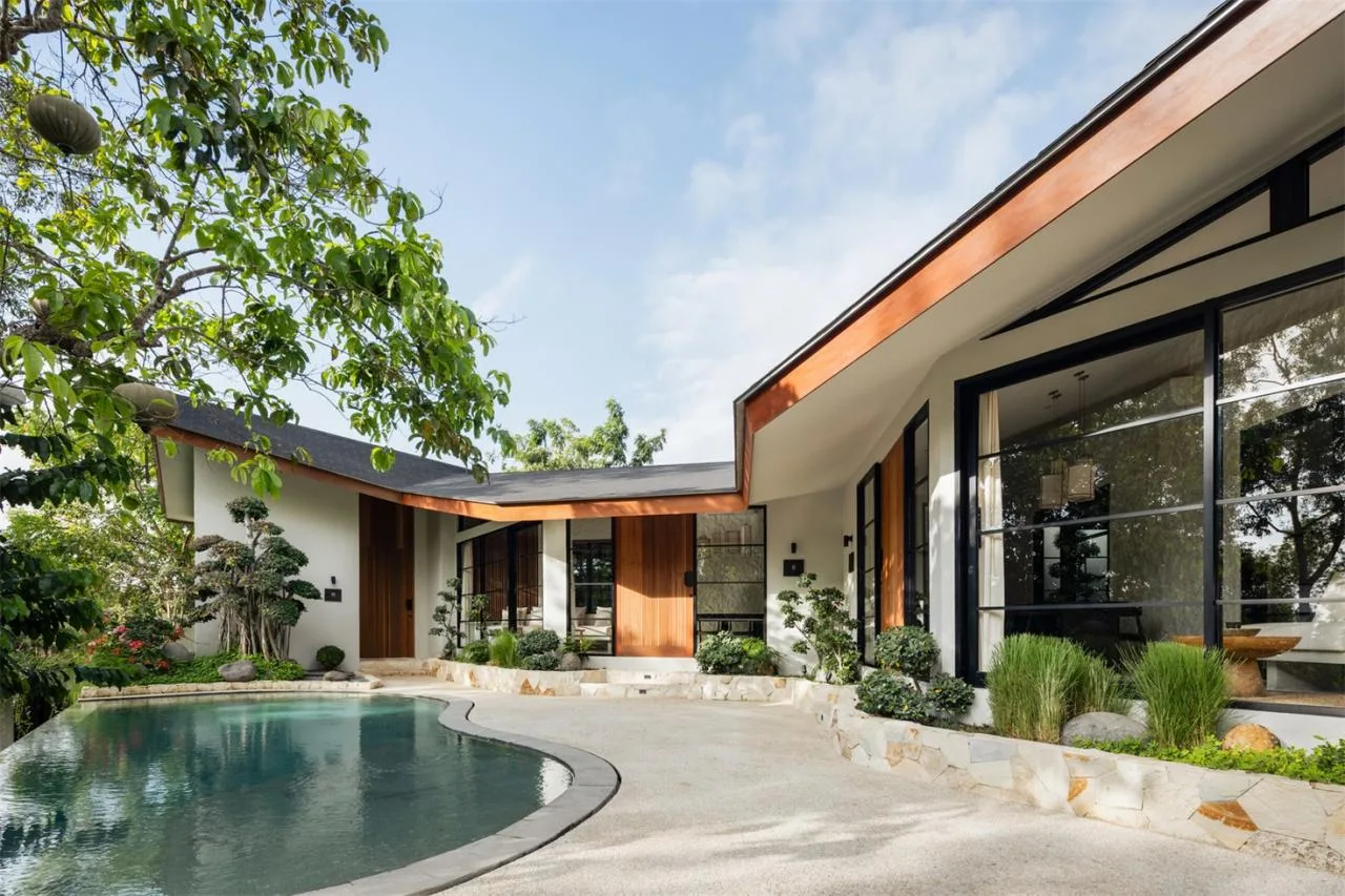 The Wabi Sabi Realm in the Poetic Forest: Design of a Natural Villa Under a Flipped Roof