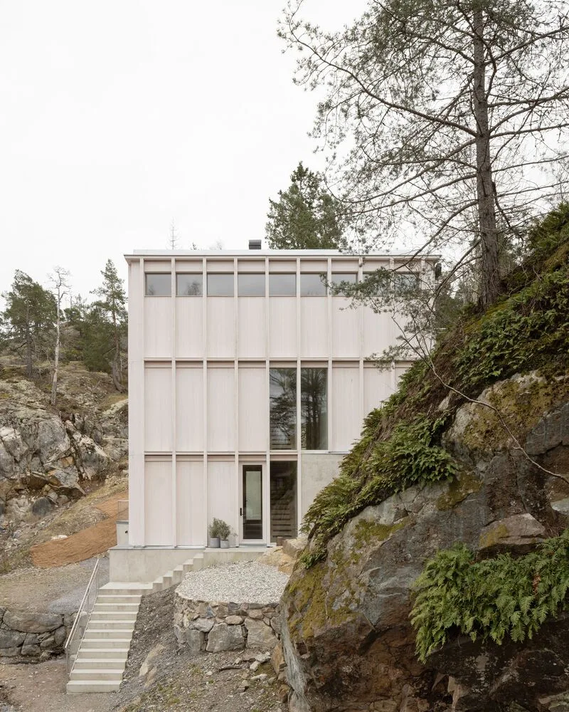 Miracle of architecture by the strait, challenging the terrain to create a stunning view of wooden villa design