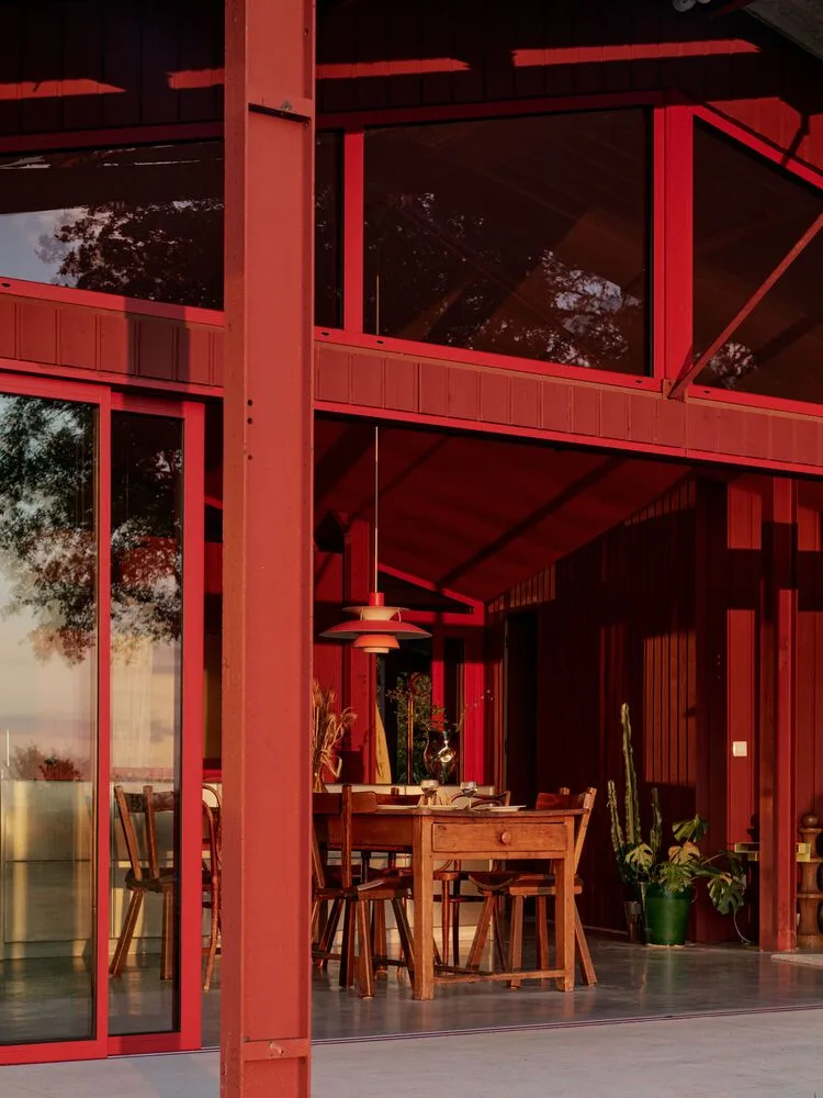 A serene vacation home design with red gemstones hidden in a lush and magnificent environment