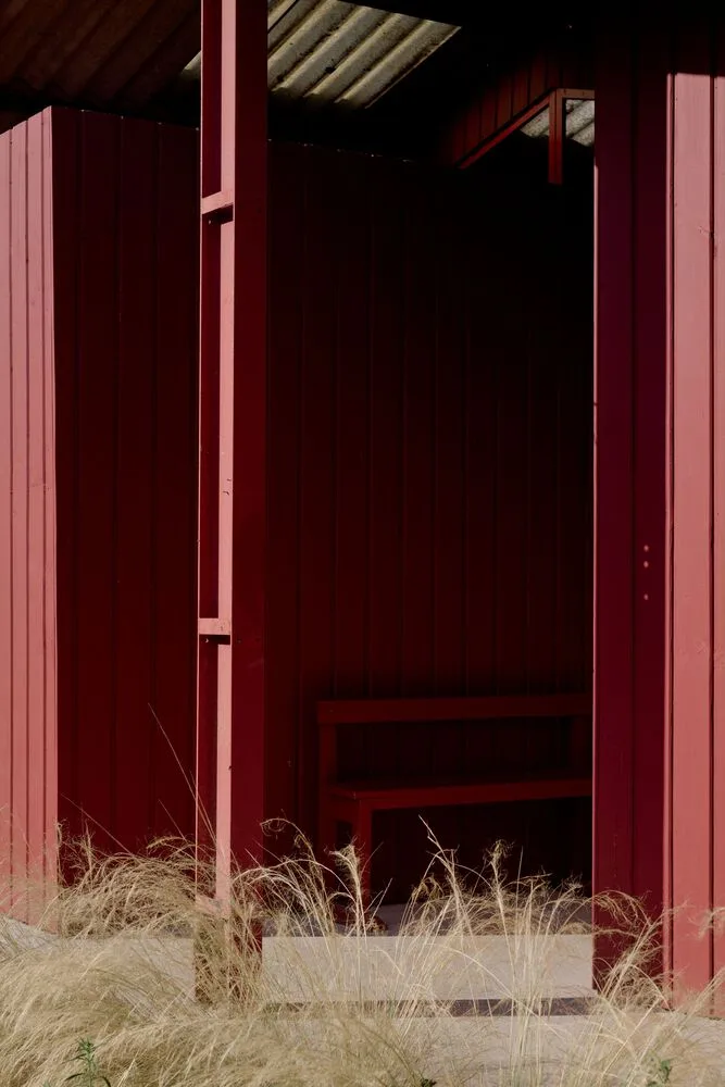 A serene vacation home design with red gemstones hidden in a lush and magnificent environment