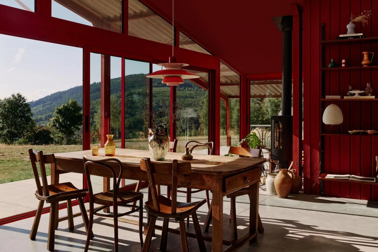 A serene vacation home design with red gemstones hidden in a lush and magnificent environment